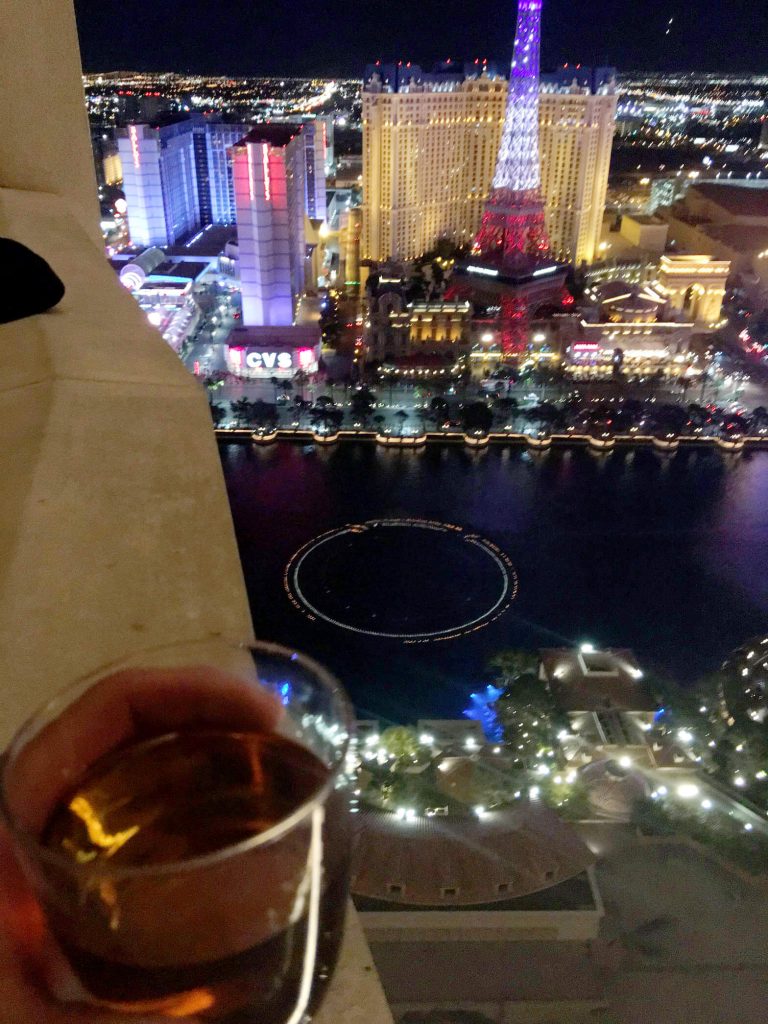 ICRS Cocktail Party looking down at the Bellagio Fountains and Paris Hotel.